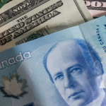 Dólar_canadense_atinge_máxima_de_sete_semanas_antes_do_Banco_do